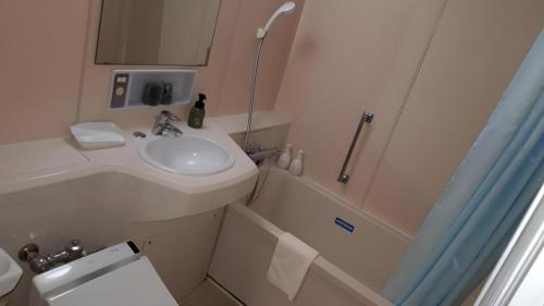 Phòng tắm tại Hotel Sunshine Iwaki