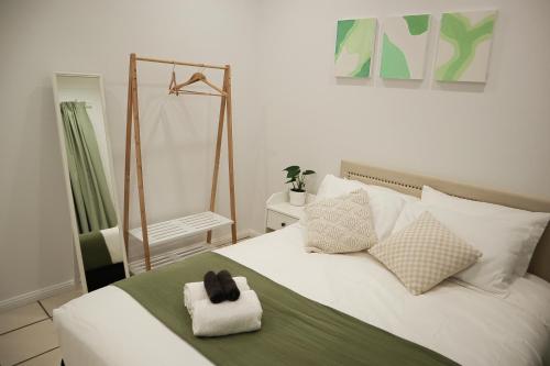 Ένα ή περισσότερα κρεβάτια σε δωμάτιο στο Double room with shared bathoom