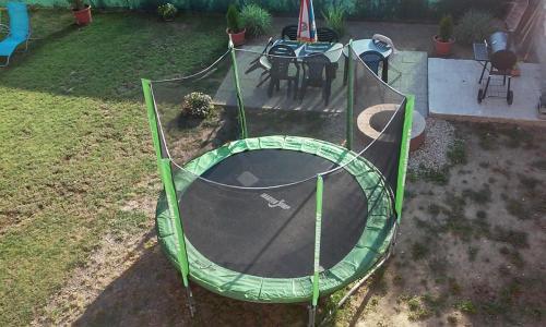 an aerial view of a tennis court in a backyard at Vila Mária Rapovce in Rapovce
