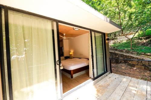 Postel nebo postele na pokoji v ubytování Dilco Nature Resort & Spa