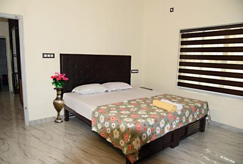 Giường trong phòng chung tại The varandah