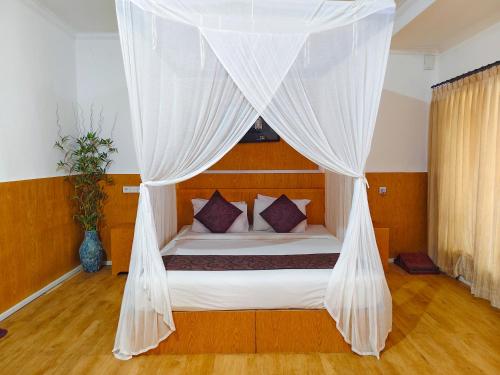 Ένα ή περισσότερα κρεβάτια σε δωμάτιο στο Private Pool Villas Seven Twenty Kuta