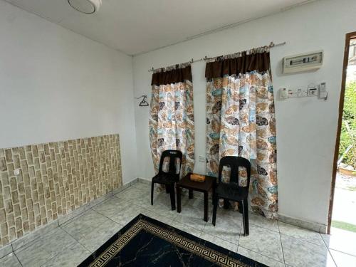 Een zitgedeelte bij Soyak Senja Roomstay