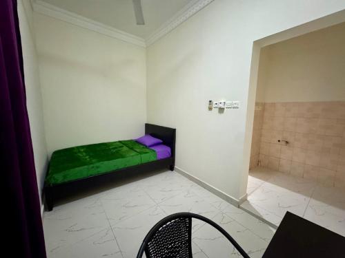 Postel nebo postele na pokoji v ubytování Beachside Room in Muscat