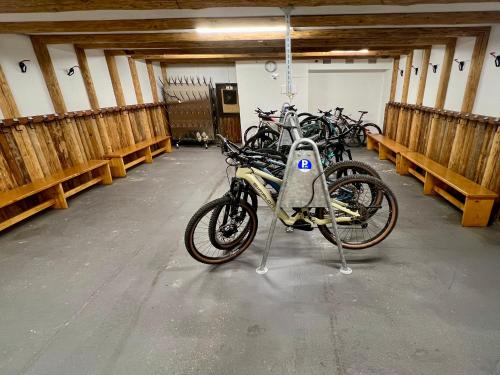 a group of bikes parked in a garage at Studio Top im des Alpes in Flims