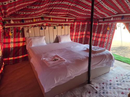 Postel nebo postele na pokoji v ubytování layali camp