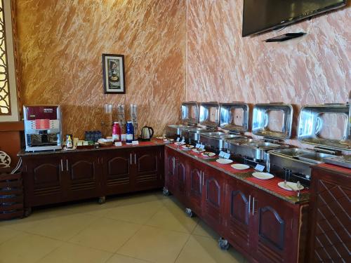 Kuchyň nebo kuchyňský kout v ubytování Hotel Blue Sapphire