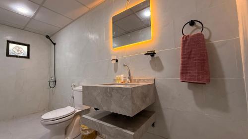 a bathroom with a sink and a toilet at Wadi Rum Stars Valley in Wadi Rum
