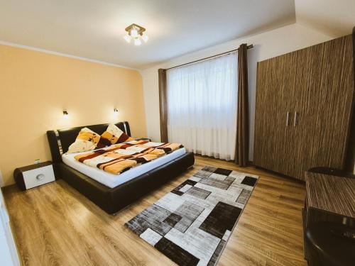 En eller flere senge i et værelse på Casa Sonne