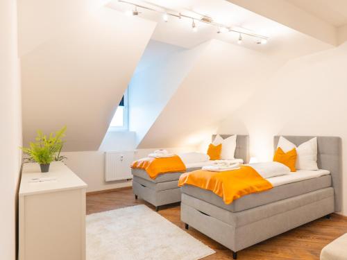 Postel nebo postele na pokoji v ubytování GreenTreeHomes - Penthouse Oak