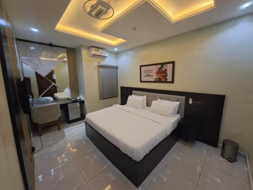 Cama ou camas em um quarto em P1 Place