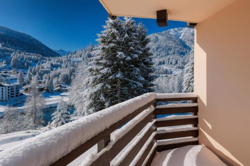 a balcony with a view of snow covered mountains at Vue Des "Chavants" Studio 20 M With Balcony in Les Houches