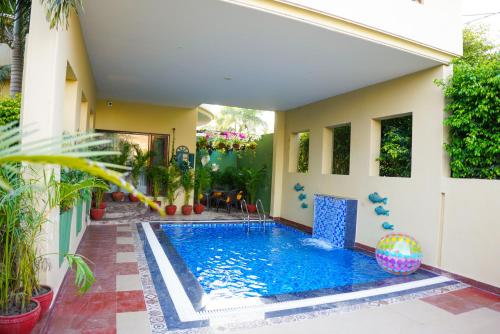 Πισίνα στο ή κοντά στο Marigold House