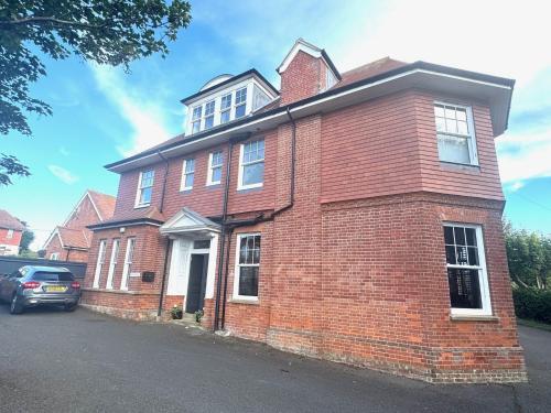 シーフォードにあるProvidence in Seafordの赤レンガ造りの家