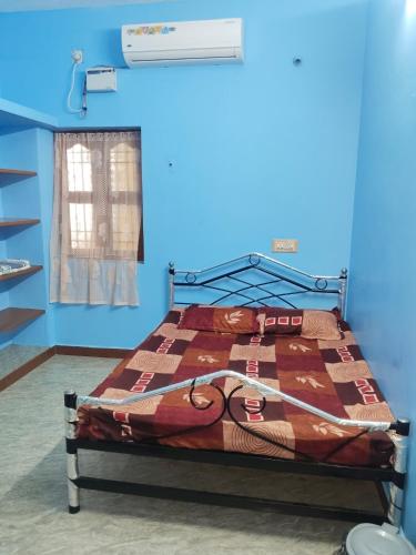 Ένα ή περισσότερα κρεβάτια σε δωμάτιο στο Jeremy Residency