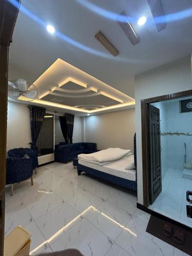 Ένα ή περισσότερα κρεβάτια σε δωμάτιο στο askari lodges