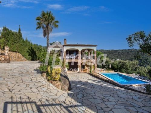 an image of a villa with a swimming pool at Villa Paradise in Calonge