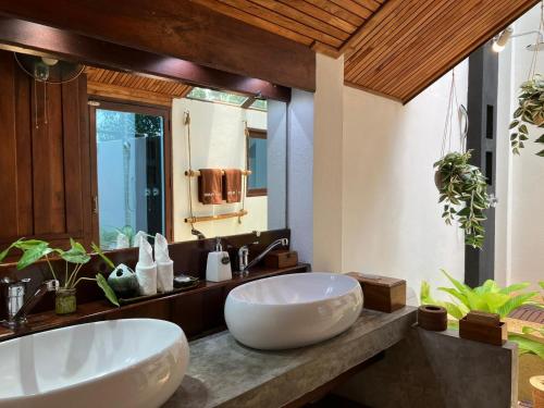 a bathroom with a large white bowl sink on a counter at The Place Luxury Boutique Villas in Koh Tao