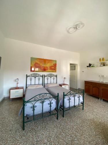 Katil atau katil-katil dalam bilik di Apartment Rino 1 Caorso