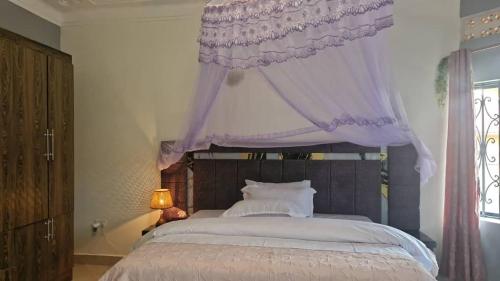 Ένα ή περισσότερα κρεβάτια σε δωμάτιο στο Guest house HELDBURG