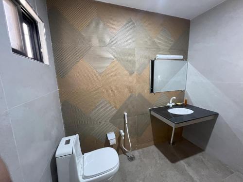 Ένα μπάνιο στο Arqam Residency Luxury Residence Hotel