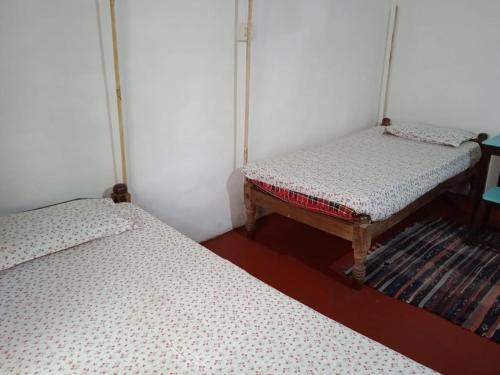 Postel nebo postele na pokoji v ubytování The Blues female only