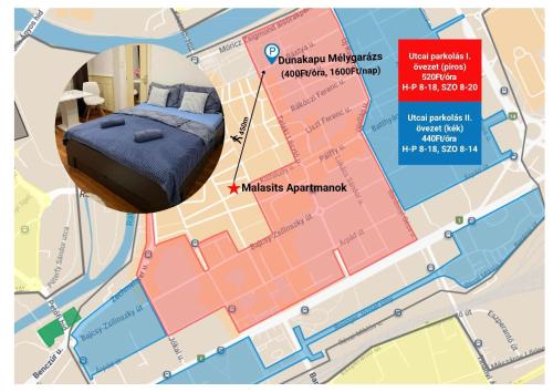 a map of a city with a bed on it at Malasits Apartman in Győr