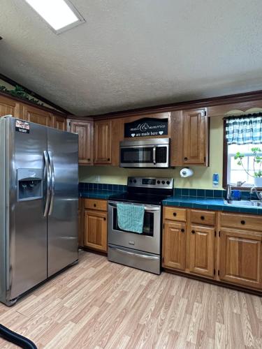 Kuchyň nebo kuchyňský kout v ubytování Devil Anse Home Rental