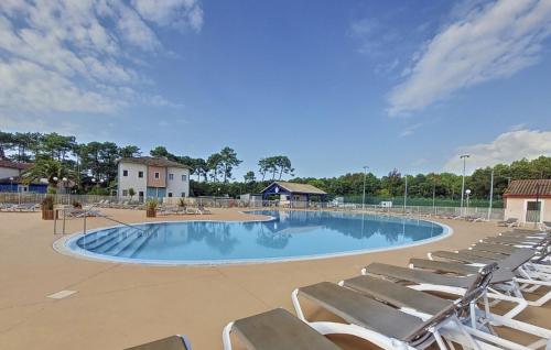 Bazén v ubytování Résidence Mes Amours d'Enfants - Les Villas du Lac nebo v jeho okolí