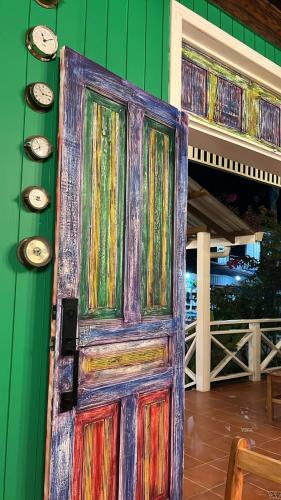 a colorful door on the side of a building at The Winand Hotel in Lívingston