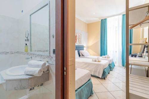 Koupelna v ubytování Hotel Suite Caesar