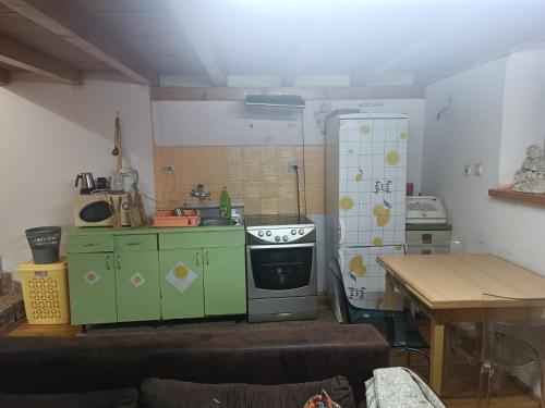 Kuchyň nebo kuchyňský kout v ubytování Maravilja