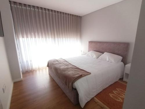 Postel nebo postele na pokoji v ubytování Casa Gonzaga