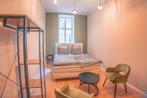 Postel nebo postele na pokoji v ubytování NEW! Exceptional design loft in a TOP location