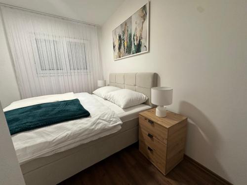 Ένα ή περισσότερα κρεβάτια σε δωμάτιο στο Elit Lux Apartments