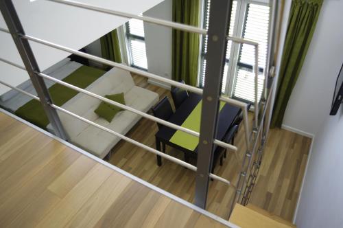a view of a room from the top floor of a house at Apartments Santis10 in Baška