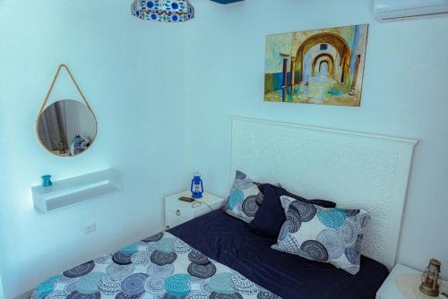 Postel nebo postele na pokoji v ubytování Dar Ajmia Villa