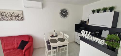 Χώρος καθιστικού στο Julianna Apartman