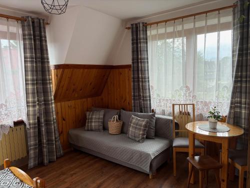 Khu vực ghế ngồi tại Apartamenty Folk Dream Harenda Zakopane