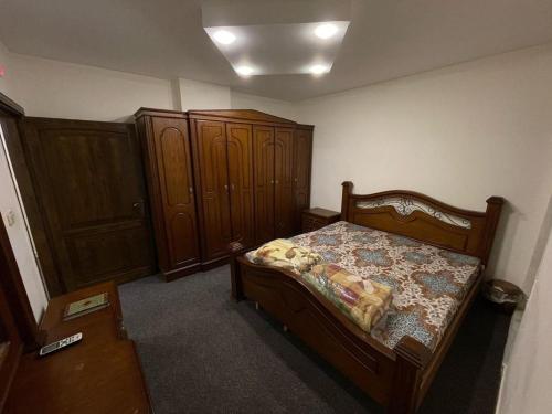 Postel nebo postele na pokoji v ubytování Toum's Apartments