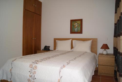 Katil atau katil-katil dalam bilik di Reguengos Hotel