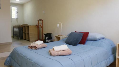 Postel nebo postele na pokoji v ubytování Rincón de Adrogué