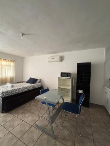 Ένα ή περισσότερα κρεβάτια σε δωμάτιο στο Casa blanca apartment