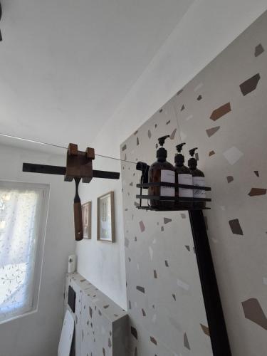 a room with a wall with a rock wall at Il Glicine Bianco in Omegna