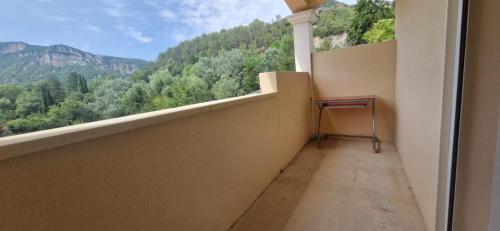 a balcony with a view of a mountain at Appartement Aubres in Aubres