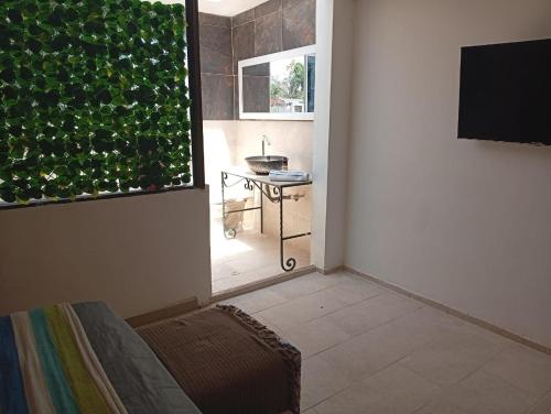 Una televisión o centro de entretenimiento en Alojamiento Independiente vipasa