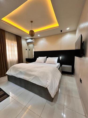 Ένα ή περισσότερα κρεβάτια σε δωμάτιο στο The Rosemont - Jeffreys Apartments