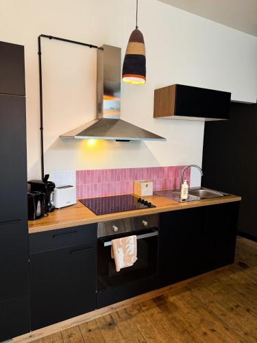 Кухня или мини-кухня в Sān home’s
