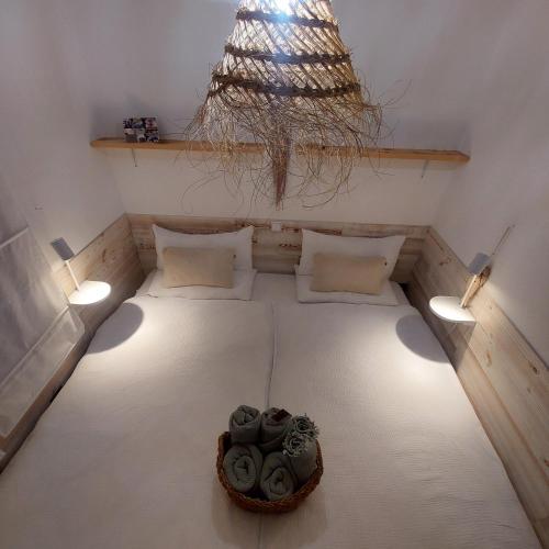 a small room with a bed with lights on it at Koje1 in Bremm