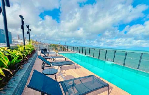 Πισίνα στο ή κοντά στο Beach haus conforto a beira mar